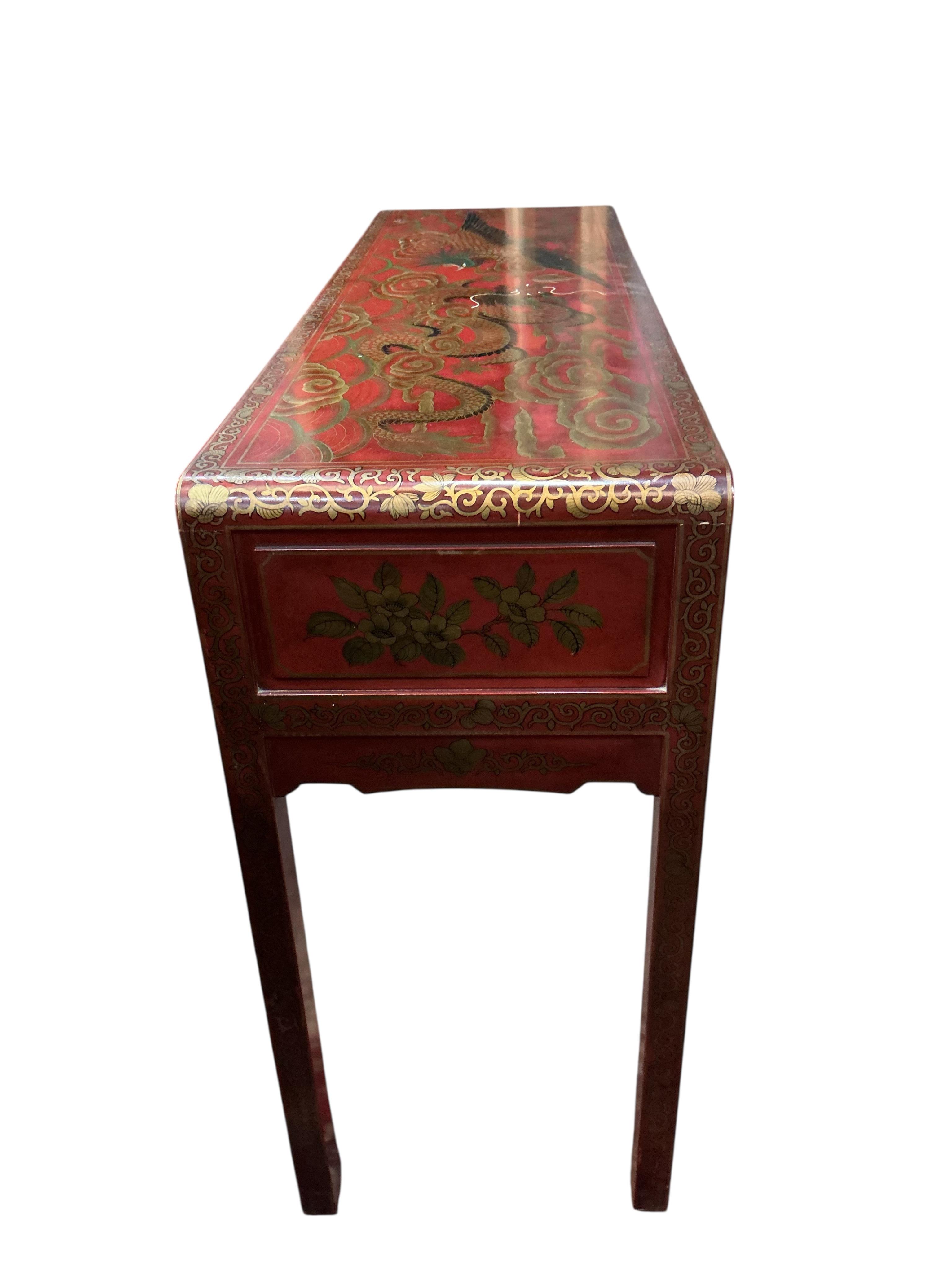 A Chinese scarlet lacquer altar table, width 138cm, depth 43cm, height 92cm